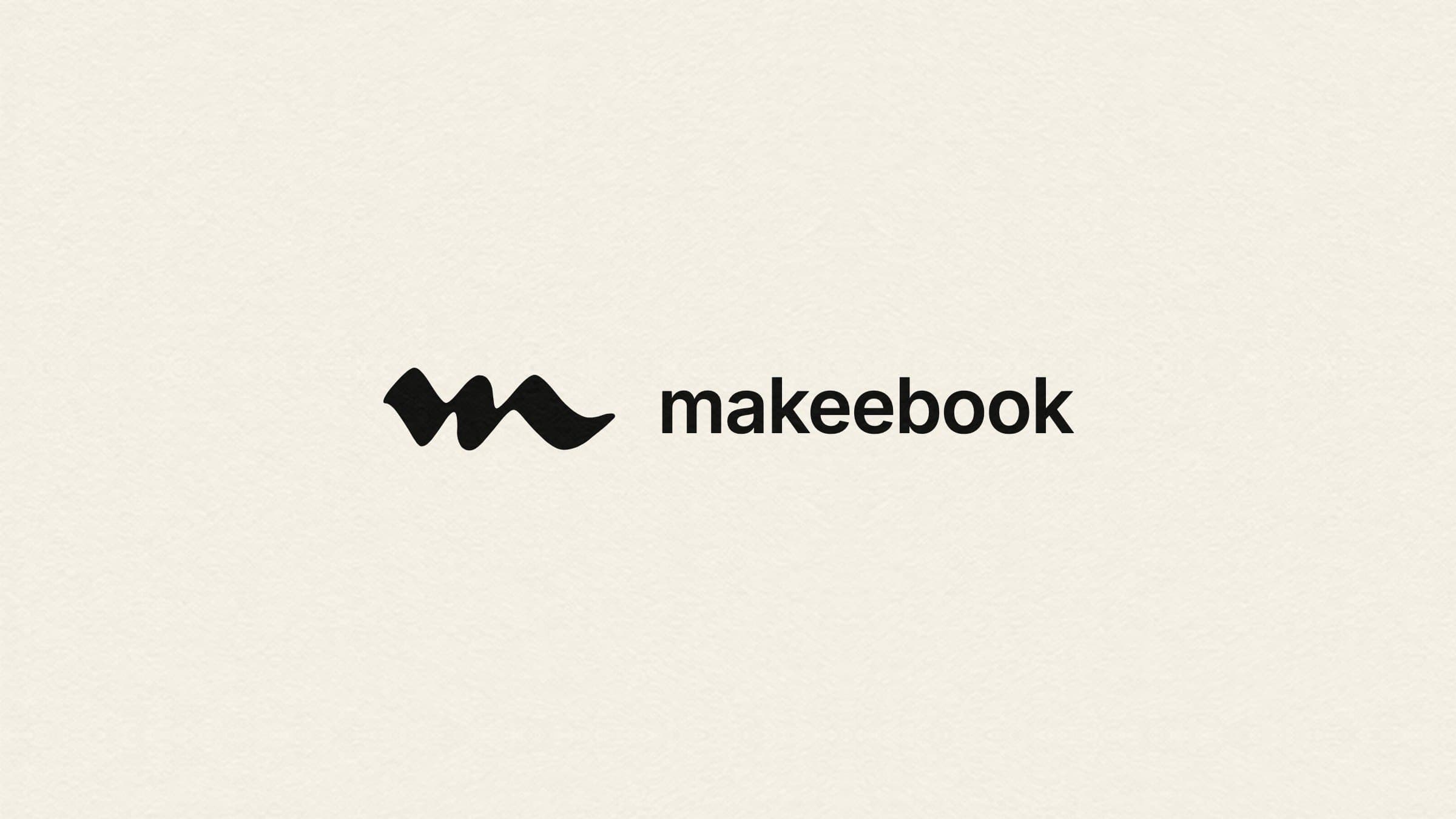 The makeebook mark and wordmark in ink on cream paper